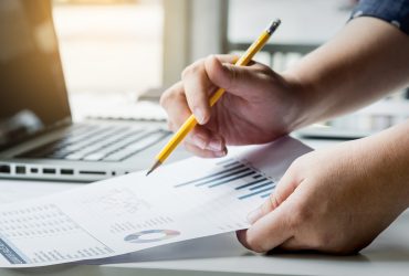 business-managers-working-with-new-startup-modern-loft-analyze-reports-plans-scaled